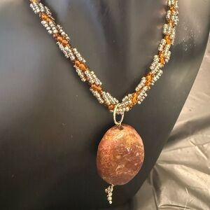 Elegant Beaded Necklace with Brown Pendant